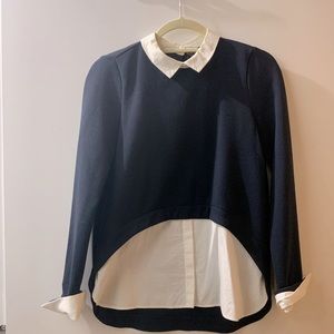 Navy sweater with attached white collard shirt.